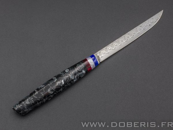 Damasteel et pierre synthétique avec éclats métalliques